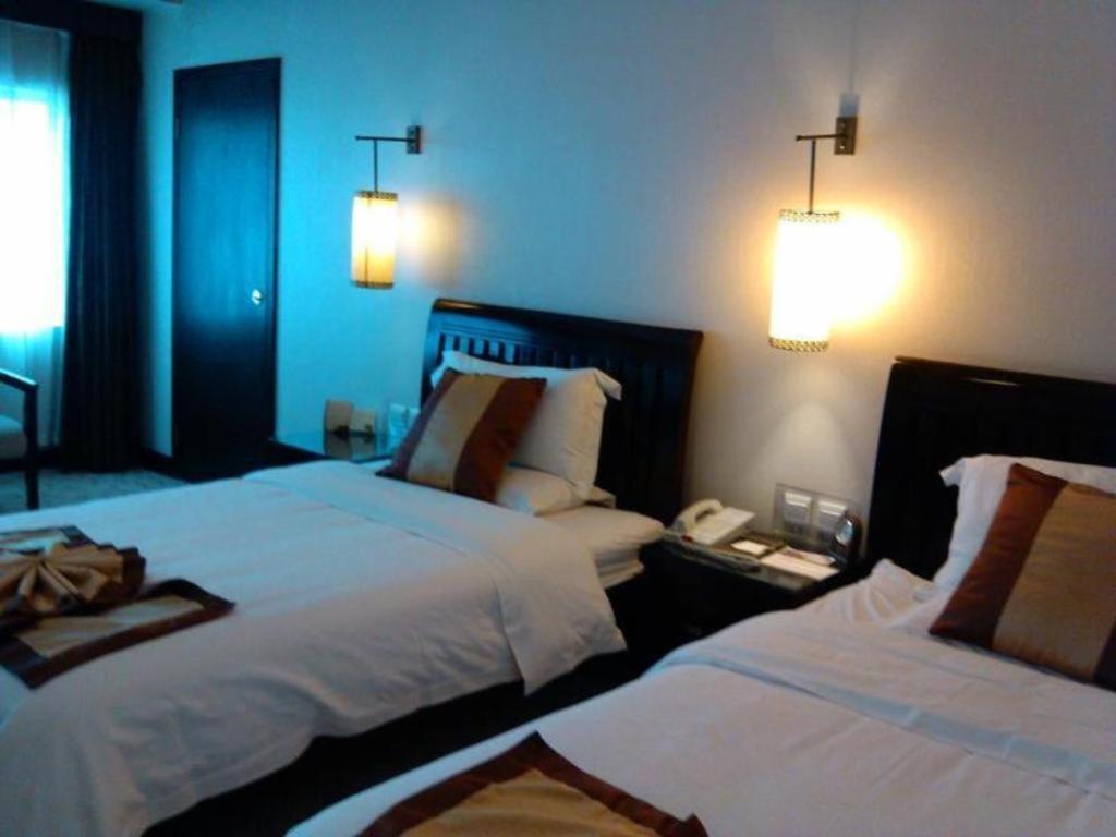 นิว อีร่า โฮเต็ล Hotel คุนหมิง ภายนอก รูปภาพ